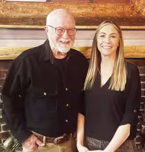 ROTARY SPEAKER -- Rotarian Vern Hay (left) invited Morris County Clerk Chelsey Schmidt to be a guest speaker at Council Grove Rotary on Wednesday. Schmidt chose the topic of elections.