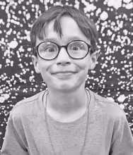 Jacob is a student in Destiny Barnett’s third grade class. His favorite color is orange. Jacob says the best gift he has ever received is a life-size Spider-Man motorcycle. He likes eating cheeseballs and playing Bloons TD 6 on the weekends. If he had a superpower it would be the power to change superpowers.