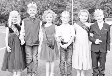 “Little People” assisting with the royalty festivities at Council Grove High School’s Homecoming ceremony Friday night were (left to right) Karsyn Mayer, Ketcham Carl, Cedar White, Owen Glessner, Oaklee Villalobos and Jackson Green. (Photo by Amber 