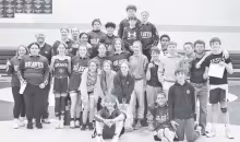 LEAGUE CHAMPIONS -- The Council Grove Junior High wrestlers earned their fifth consecutive league title Tuesday night. Pictured are: back row (L to R) - Coach Dustin SanRomani, Madison Kopf, Brinley Ink, Lupita Gonzalez, Kyle Dean, David Mascote, Dominic Craig (under armour) Jeremiah Watson (at the top), Kolt Johnson, Kamdon Young, Hudson Hartman (hiding) Wyatt Hutchinson, middle - Azlynn Adams, Gabby Beck, Samantha McDonald, Alaynna Craige, Maddison Kepley, Declan SanRomani, Andi Harbough, Marshal Walburn,