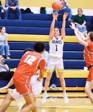 PICOLET FOR THREE -- Braves junior Jadyn Picolet goes for one of his triple three-pointers on the night as the Braves are defeated 68-38 by the Burlingame Bearcats at home last night. Jadyn finished with 11 points. (Photo by Amber Weeks)