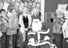 CHRISTMAS STOCKING PROJECT -- Some groups who participated in the Fort Riley USO Christmas Stocking project were invited to attend the ribbon cutting ceremony at Operation Santa Claus Wednesday, Nov. 2 at Fort Riley. The Council Oak DAR participated for t CHRISTMAS STOCKING PROJECT