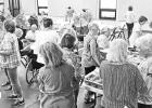 FIRST DAY LUNCH -- Retired USD 417 educators gathered for a salad luncheon Thursday to celebrate the first day of school at St. Rose Catholic Church. About 40 people brought a variety of salads — from greens to pasta, coleslaw and fruit — to share for FIRST DAY LUNCH