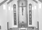 Following flooding of the sanctuary due to broken pipes, the newly renovated St. Rose Catholic Church includes new tile on the altar.