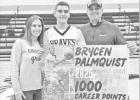 HITS 1000 CAREER POINTS . . . Brycen Palmquist, with his parents Dawn and Lucas Palmquist, celebrated Thursday night as Brycen is now one of only two players in Council Grove High School history to reach 1000 career points. (Gary Carrier was the other.) P HITS 1000 CAREER POINTS . . . Brycen Palmquist, with his parents Dawn and Lucas Palmquist, celebrated Thursday night as Brycen is now one of only two players in Council Grove High School history to reach 1000 career points. (Gary Carrier was the other.) P