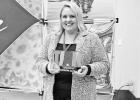 PLACING FIRST . . .Destination : Council Grove won the best small budget visitors guide in Kansas for the second consecutive year at the Kansas Tourism Conference in Manhattan, hosted by the Travel Industry Association of Kansas. Zoey Wadick, CVB and Comm