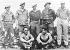 The unnamed men in the photo were Prisoners of War in Kansas. The photo was one of the few items saved by Alois Artur Bauer. Austrians Visit Council Grove, Seeking WWI POW Answers