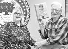 COUNCILMAN RETIRES -- Mayor Debi Schwerdtfeger presented retiring Ward 1 councilman Larry Siegrist with a plaque for his knowledge and four years of service to Council Grove. COUNCILMAN RETIRES