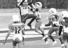 WHAT A CATCH -- Council Grove Youth Football had its last game in Wamego on Saturday. Pictured is Baer Chavez reaching for a red zone passed ball from Brantley Hilton. Ian Stockwell ran the last two yards for a touchdown on the next play. The 6th grade te WHAT A CATCH