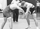 DEFEATS TOP-RANKED WRESTLER