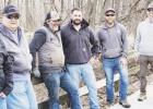 CLEAN UP CREW -- The Council Grove Rotary Club conducted a cleanup of trash and debris on and around the Flint Hills Trail, south of Bolton Cars, Ray’s Apple Market and Adams Homestore Wednesday evening. About a dozen large bags of trash, cardboard boxe CLEAN UP CREW