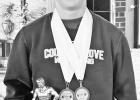 BREAK POWERLIFING MEET RECORDS -- Council Grove Braves Powerlifters Landon Dody (left) and Bradley Doornbos scored big in Conway Springs where they broke meet records and were the strongest pound for pound lifters in their divisions. BREAK POWERLIFING MEET RECORDS