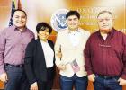 BECOMES U.S. CITIZEN -- Leo Salas, a sophomore at Council Grove High School, became a citizen of the United States on Tuesday at the U.S. Citizenship &amp; Immigration Services office in Kansas City. Pictured left to right are his brother Enrique Salas Jr