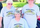 CONSISTENT VENDORS -- Known to be consistent vendors at the Morris County Farmers Market in all types of weather are (l to r) Elaine Puckett, Janet Edwards and Kathy Miller. Other vendors also join the ladies at the farmers market, which runs 4-6 p.m., on