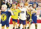 Brandy Villalobos caught this shot of some future Council Grove High School Braves wrestlers showing their muscles during the Wamego Youth Wrestling Tournament January 22. Pictured are Bennett Stohs (left), Baker SanRomani, Dodger Day, Rudson Villalobos a Through Your Eyes
