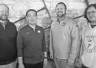 Rotarians were treated to hearing about K-State bands on Wednesday from Dr. Alex Wimmer, new Director of Bands and Director of the Marching Band. Pictured (l to r) are: Rotarian Cody Catlin, Dr. Alex Wimmer, Rotarian Ryan Moss who arranged for the speaker