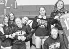 STATE BOUND -- Council Grove and Northern Heights High Schools had six girls qualify for the 321A State Wrestling Tournament that will be February 27 and 28 in Hays. Those qualifying and pictured with their coach Brogan Humphrey are - (L to R): Savannah S
