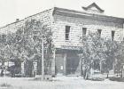 PEARL OPERA HOUSE 1910 -- A photograph showing Pearl Opera House as it appeared in 1910. Note the ornamental, triangular inscribed sign on top of the building. Note also the horse and buggy hitched to the left and the carefully-planted trees. (SOURCE: Wab The Pearl Becomes The Alta Vista Community Center Again