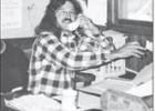 IN THE EARLY YEARS -- Eric Nelson, as a young business owner, was captured talking to a client in approximately 1990.