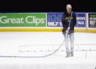 PREPPING THE ICE -- Jaxon Heath, formerly of Council Grove, was applying white paint to the ice at Intrust Bank Arena last week in preparation for the U. S. Figure Skating Championships that are coming to Wichita this week. Photo: Wichita Eagle