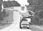 A crop-dusting helicopter was captured having its chemical tank refilled from a truck on Lake Road on June 6. The stunning photo was captured by Chase County resident Theresia Martin.