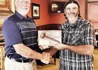 HONORING SERVICE -- New Council Grove Rotary Club President Travis Griffin presents outgoing president Lucas Cosgrove with a plaque honoring his service to the organization the past year. Members of the Executive Board are Travis Griffin, President, Deidr Former Herington Assistant Police Chief Loses Credentials