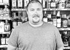 NEW OWNER -- Lucas Kohler, owner of LK Liquors, at 400 E. Main St., is excited to own the store where he has worked for 8 years. LK Liquors Was Eight Years In The Making