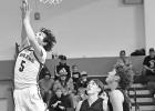 Herington High School junior Cameron Strauss (5) leaps up for a basket in last Thursday’s non-league basketball game. The Railers hosted Bennington High, with the Bulldogs earning the win, 55-25. (Photo by Susan Mueller) Herington High School junior Cameron Strauss (5) leaps up for a basket in last Thursday’s non-league basketball game. The Railers hosted Bennington High, with the Bulldogs earning the win, 55-25. (Photo by Susan Mueller)
