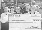 A $40K Kansas Tourism Attraction Development Grant was awarded to the Historic Preservation Corporation on Wednesday, March 18, 2026. On hand to celebrate the occasion with proprietors Shirley and Ken McClintock were (l to r) back row: Jeremy Hilt, Ryan M