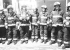 NEW BUNKER GEAR -- Alta Vista Firefighters are shown with some of their new gear that was purchased with two grants