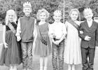 “Little People” assisting with the royalty festivities at Council Grove High School’s Homecoming ceremony Friday night were (left to right) Karsyn Mayer, Ketcham Carl, Cedar White, Owen Glessner, Oaklee Villalobos and Jackson Green. (Photo by Amber 