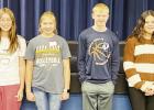 SPELLING BEE CHAMPION -- Lilly Wirtz, second from the left, is named Council Grove Junior High Spelling Bee champion during competition Wednesday. To her left is Faith Campbell (4th), Lilly Wirtz (1st), Bradley Doornbos (2nd), and Hannah Peterson (3rd). SPELLING BEE CHAMPION